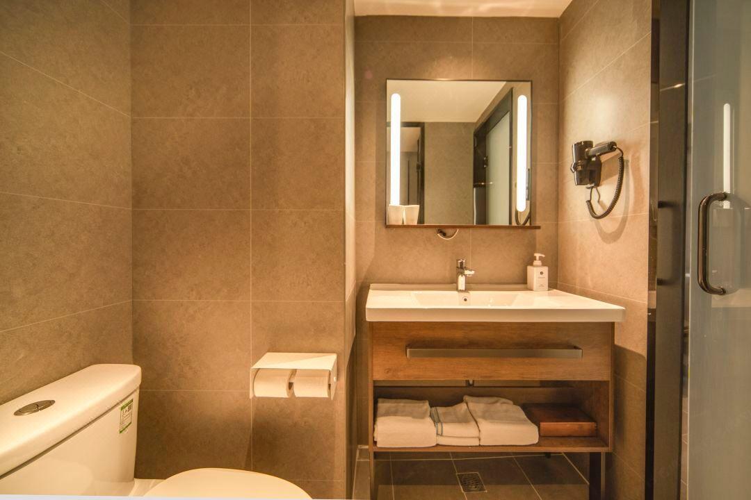 Hanting Hotel Shenyang Sujiatun Railway Station Экстерьер фото